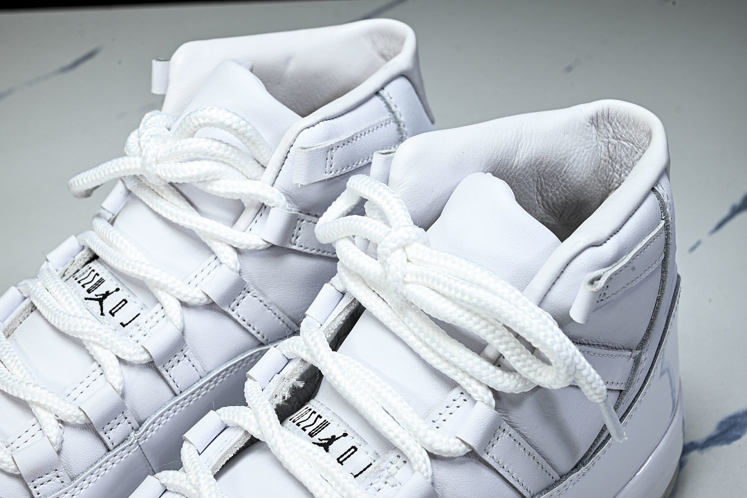Comme Des Garçons x Air Jordan 11 "White" IV7639-100