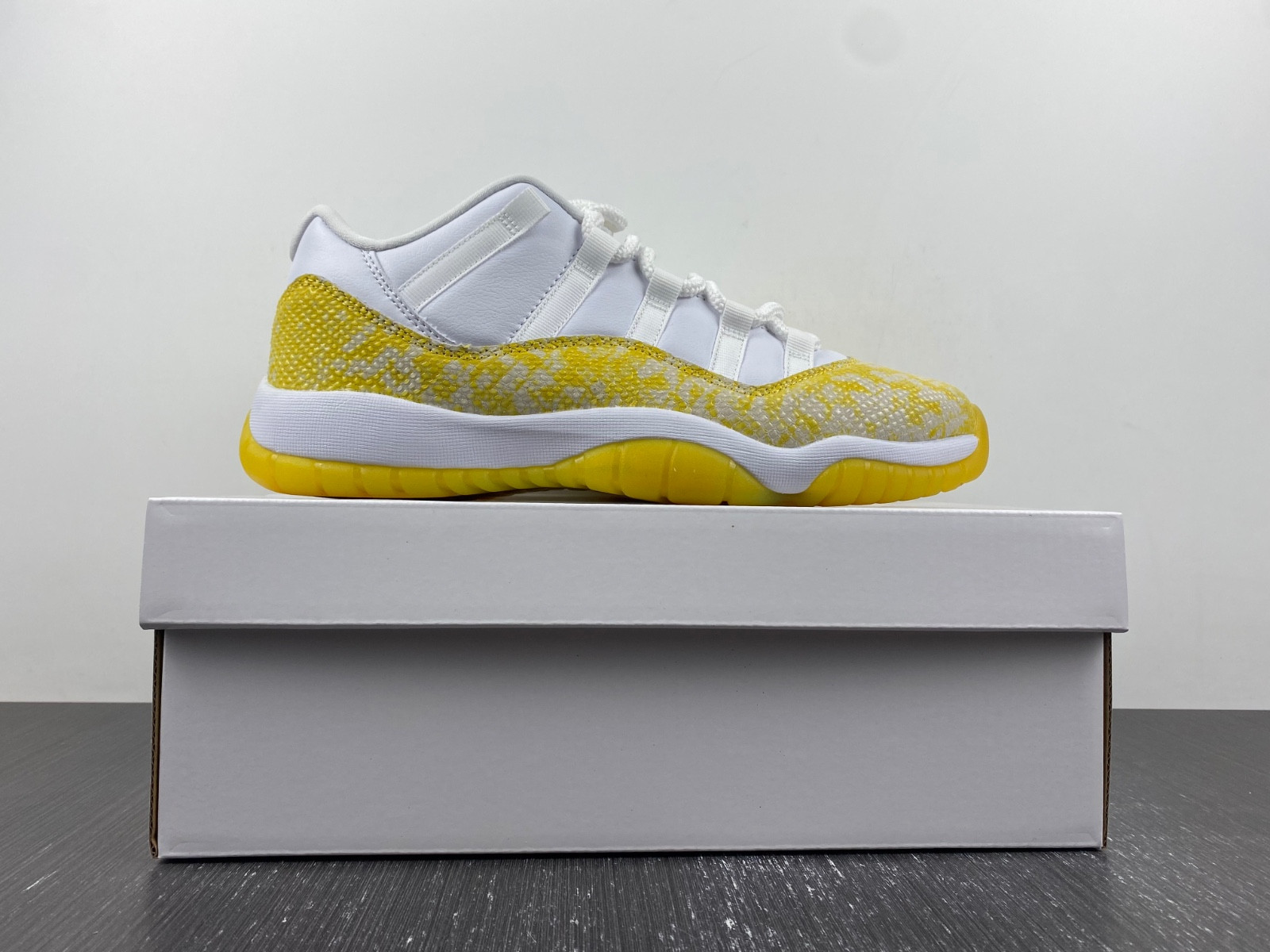 Air Jordan 11 Low WMNS “Yellow Snakeskin” AH7860-107