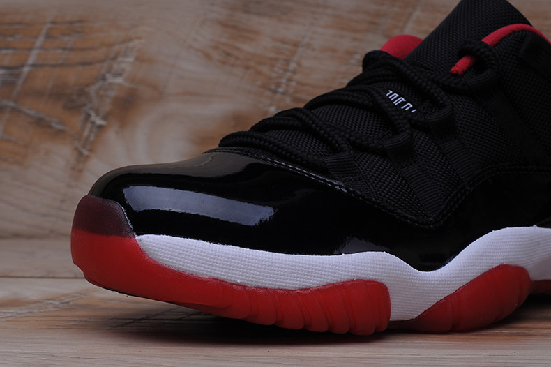 AIR JORDAN 11 RETRO LOW "BRED" BLACK/ RED mens 528895-012